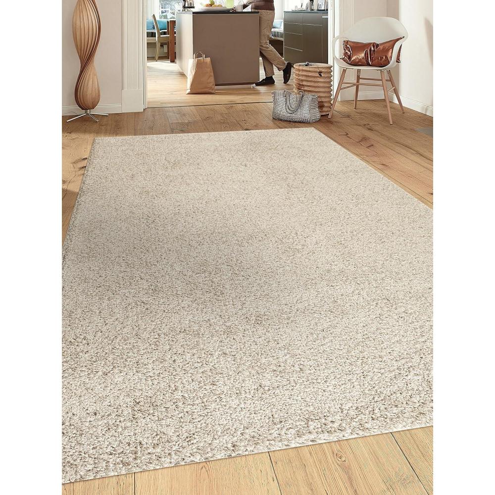imageCozy Solid Cream 53quot x 73quot Indoor Shag Area Rug
