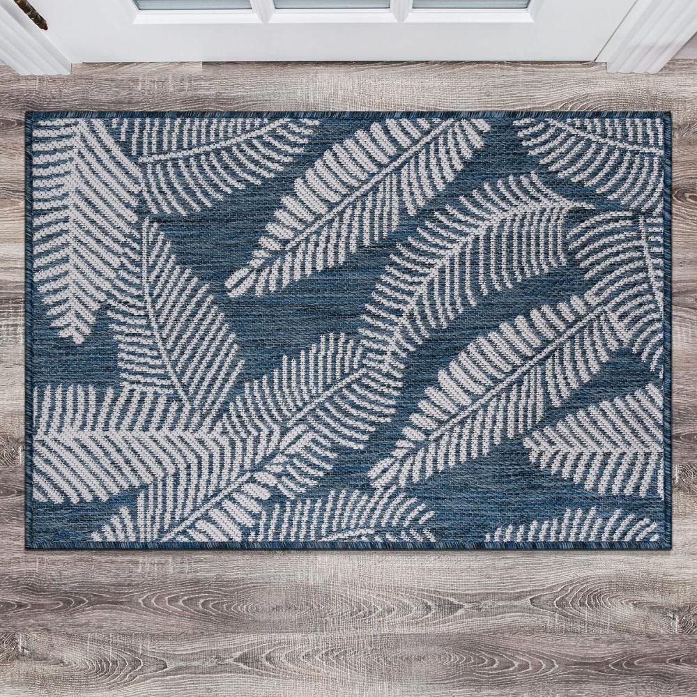 imageRugshop Bella Distressed Palm Leaves Textured Flat Weave Easy Cleaning Outdoor Rugs for DeckPatioBackyard IndoorOutdoor Area Rug 5 x 7 YellowNavy