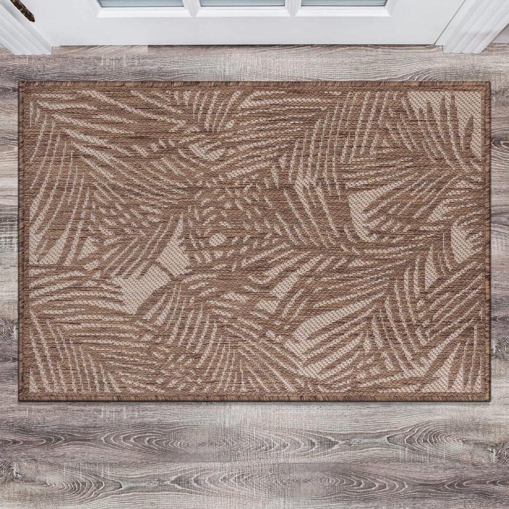 imageRugshop Contemporary Palm Leaf Textured Flat Weave Easy Cleaning Outdoor Rugs for DeckPatioBackyard IndoorOutdoor Area Rug 5 x 7 BrownBrown